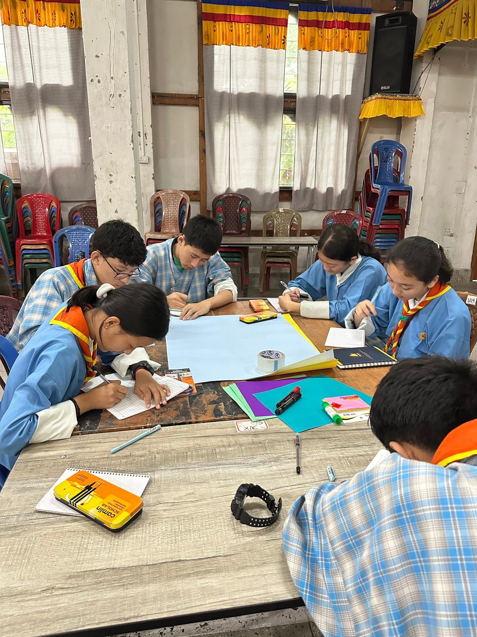 Students participating in a group activity at Phuentsholing Higher Secondary School
